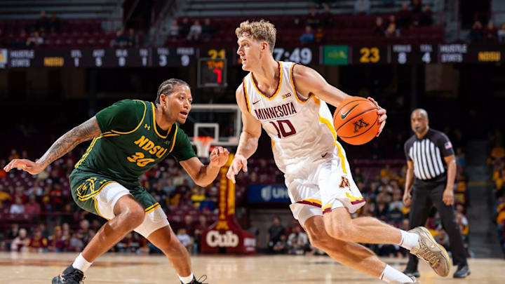 Gophers forward Cade Tyson (10) drives against NDSU during an exhibition game at Williams Arena. 