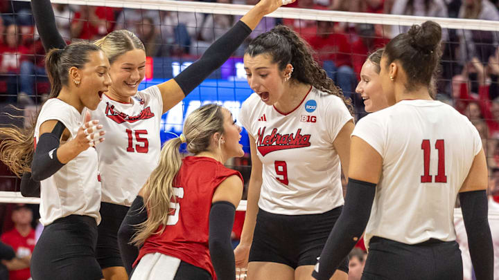 Nebraska players celebrate an ace by libero Laney Choboy against Kansas State in the second round of the NCAA Tournament. Nebraska players celebrate an ace by libero Laney Choboy against Kansas State in the second round of the NCAA Tournament.