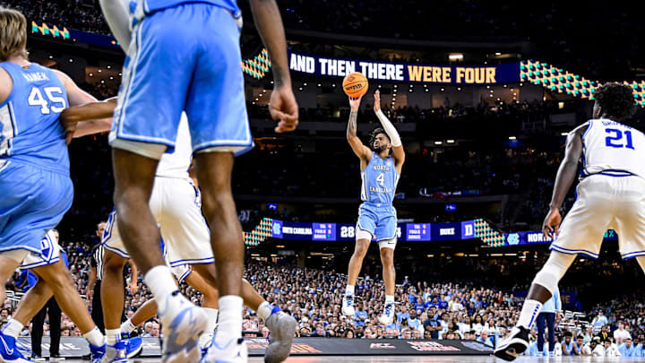 North Carolina’s RJ Davis shoots against Duke in the 2022 Final Four. The Tar Heels beat their rival, 81–77, to advance to the title game.