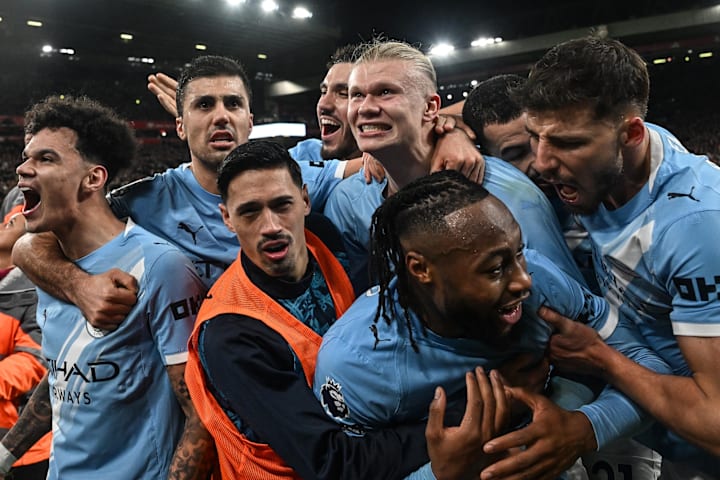 Man City players celebrate.