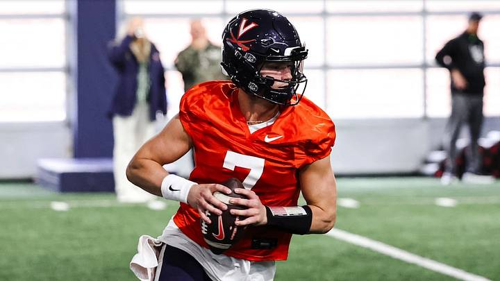 Virginia Cavaliers quarterback Beau Pribula (7) drops back in spring practice. Virginia Cavaliers quarterback Beau Pribula (7) drops back in spring practice.