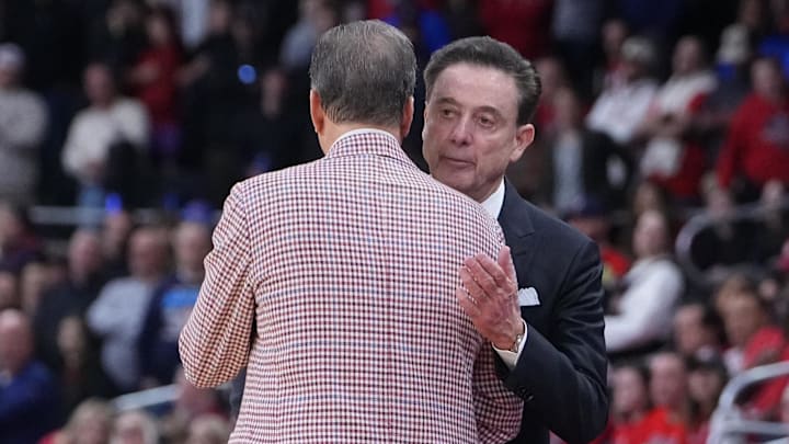 Mar 22, 2025; Providence, RI, USA; St. John's basketball head coach Rick Pitino and Arkansas Razorbacks head coach John Calipari shake hands as the Razorbacks won a second round men’s NCAA Tournament game at Amica Mutual Pavilion.