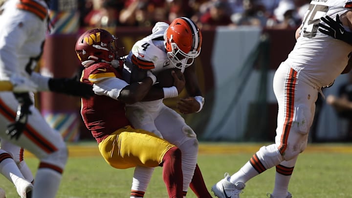 Oct 6, 2024; Landover, Maryland, USA; Cleveland Browns quarterback Deshaun Watson (4) is sacked by Washington Commanders linebacker Dante Fowler Jr. (6) during the third quarter at NorthWest Stadium. Mandatory Credit: Geoff Burke-Imagn Images Oct 6, 2024; Landover, Maryland, USA; Cleveland Browns quarterback Deshaun Watson (4) is sacked by Washington Commanders linebacker Dante Fowler Jr. (6) during the third quarter at NorthWest Stadium. Mandatory Credit: Geoff Burke-Imagn Images