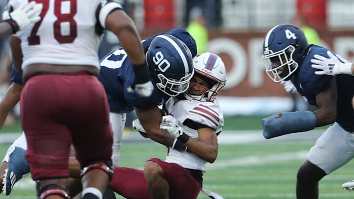 South Carolina State's Caden High is hit by Georgia Southern's Da'Shawn Davis on Saturday, September 14, 2024 at Allen E. Paulson Stadium. South Carolina State's Caden High is hit by Georgia Southern's Da'Shawn Davis on Saturday, September 14, 2024 at Allen E. Paulson Stadium.