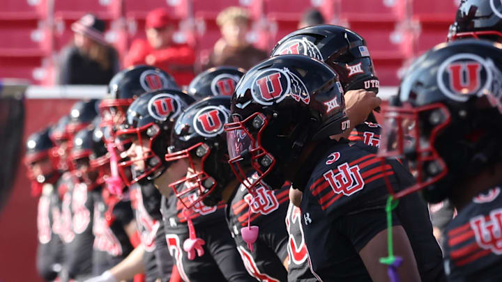 The Utah Utes warm up before the game against the Kansas State Wildcats at Rice-Eccles Stadium.