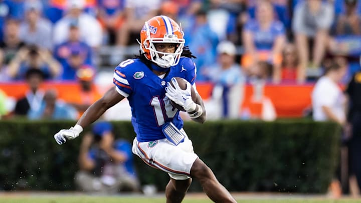 Sep 14, 2024; Gainesville, Florida, USA; Florida Gators wide receiver Tank Hawkins (10) runs with the ball against the Texas A&M Aggies during the second half at Ben Hill Griffin Stadium. Mandatory Credit: Matt Pendleton-Imagn Images