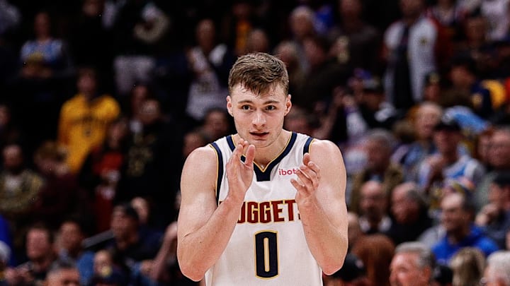 Nov 4, 2024; Denver, Colorado, USA; Denver Nuggets guard Christian Braun (0) reacts after a play in the fourth quarter against the Toronto Raptors at Ball Arena. Mandatory Credit: Isaiah J. Downing-Imagn Images Nov 4, 2024; Denver, Colorado, USA; Denver Nuggets guard Christian Braun (0) reacts after a play in the fourth quarter against the Toronto Raptors at Ball Arena. Mandatory Credit: Isaiah J. Downing-Imagn Images