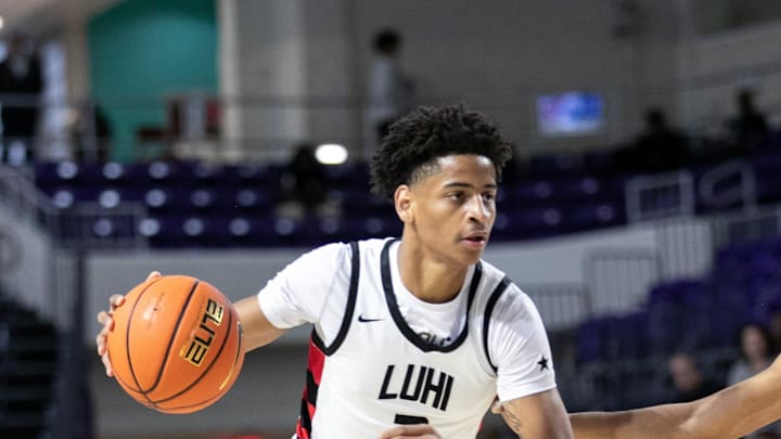 Syracuse basketball legends Carmelo Anthony and Gerry McNamara watched 2025 four-star shooting guard Kiyan Anthony.