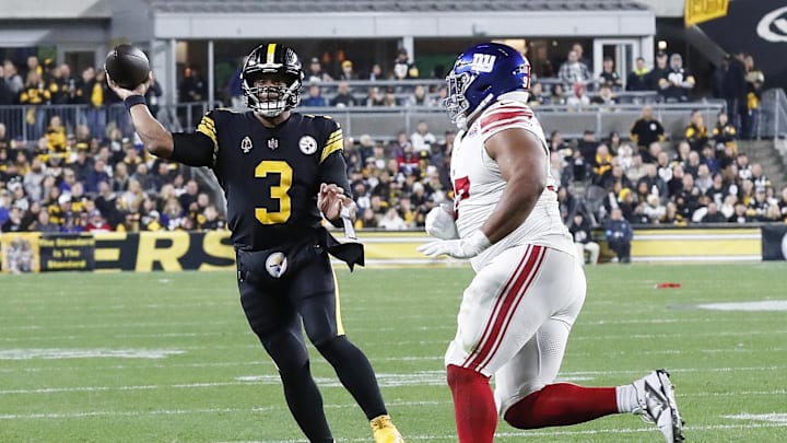 Russell Wilson throws a pass against the Giants in 2024.