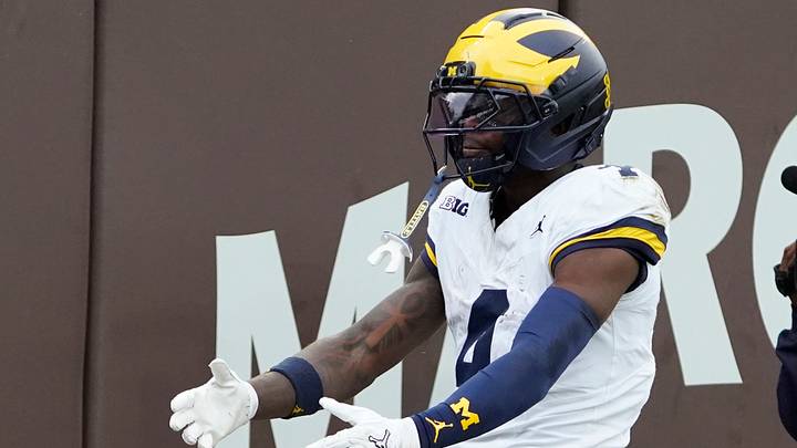 Nov 15, 2025; Chicago, Illinois, USA; Michigan Wolverines wide receiver Andrew Marsh (4) gestures after a first down against the Northwestern Wildcats during the first half at Wrigley Field. Mandatory Credit: David Banks-Imagn Images Nov 15, 2025; Chicago, Illinois, USA; Michigan Wolverines wide receiver Andrew Marsh (4) gestures after a first down against the Northwestern Wildcats during the first half at Wrigley Field. Mandatory Credit: David Banks-Imagn Images