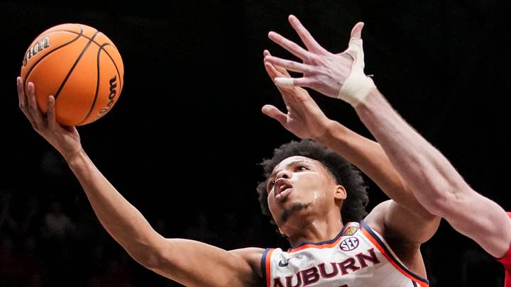 Auburn Tigers guard Keyshawn Hall (7) goes up for a basket against Illinois State Redbirds forward Brandon Lieb (12) on Thursday, April 2, 2026, during an NIT semifinals matchup at Hinkle Fieldhouse in Indianapolis. Auburn Tigers guard Keyshawn Hall (7) goes up for a basket against Illinois State Redbirds forward Brandon Lieb (12) on Thursday, April 2, 2026, during an NIT semifinals matchup at Hinkle Fieldhouse in Indianapolis.