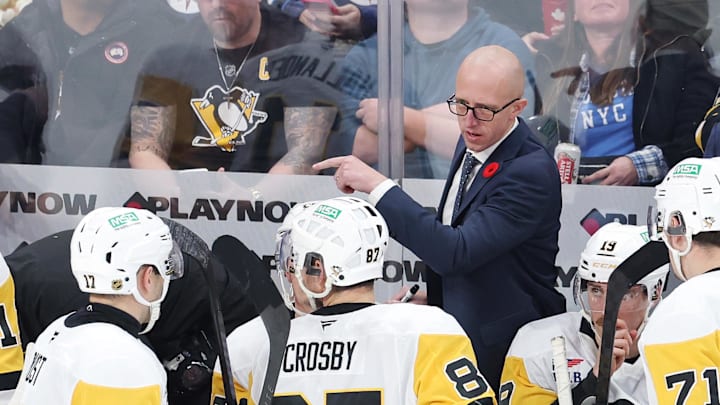 Nov 1, 2025; Winnipeg, Manitoba, CAN; Pittsburgh Penguins head coach Dan Muse instructs players during a time out against the Winnipeg Jets in the third period at Canada Life Centre. Mandatory Credit: James Carey Lauder-Imagn Images