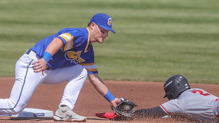 RubberDucks second baseman Travis Bazzana applies the tag to Altoona Curve’s Termarr Johnson, who was called safe with a stolen base, on April 13, 2025, in Akron, Ohio. RubberDucks second baseman Travis Bazzana applies the tag to Altoona Curve’s Termarr Johnson, who was called safe with a stolen base, on April 13, 2025, in Akron, Ohio.