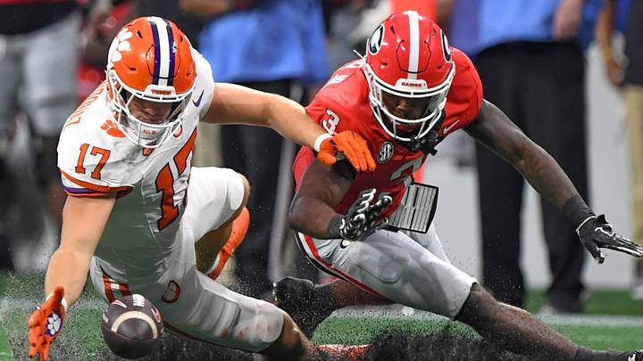 Aug 31, 2024; Atlanta, Georgia, USA; Clemson Tigers linebacker Wade Woodaz (17) reaches for an incomplete pass against Georgia Bulldogs running back Nate Frazier (3) during the third quarter of the 2024 Aflac Kickoff Game at Mercedes-Benz Stadium. Mandatory Credit: Ken Ruinard-USA TODAY Sports Aug 31, 2024; Atlanta, Georgia, USA; Clemson Tigers linebacker Wade Woodaz (17) reaches for an incomplete pass against Georgia Bulldogs running back Nate Frazier (3) during the third quarter of the 2024 Aflac Kickoff Game at Mercedes-Benz Stadium. Mandatory Credit: Ken Ruinard-USA TODAY Sports