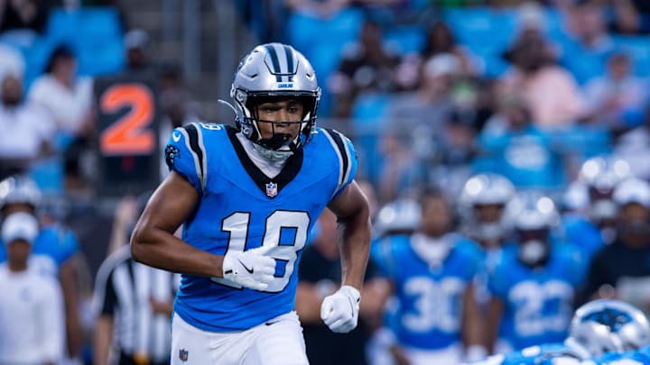 Aug 8, 2025; Charlotte, North Carolina, USA; Carolina Panthers wide receiver Jalen Coker (18) goes in motion during the second quarter against the Cleveland Browns at Bank of America Stadium. 