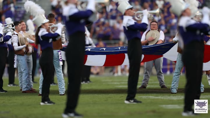 The TCU Marching Band plays the Star Spangled Banner prior to kickoff between the TCU Horned Frogs and the Abilene Christian Wildcats.