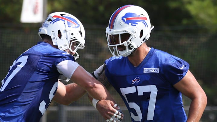 Bills edge Joey Bosa punches the ball out of the hands of A.J. Epenesa during drills during the second day of Buffalo Bills training camp at St. John Fisher University Thursday, July 24, 2025 in Pittsford.