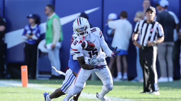 Oct 12, 2024; Provo, Utah, USA; Arizona Wildcats wide receiver Chris Hunter (16) goes for a catch against the Brigham Young Cougars during the fourth quarter at LaVell Edwards Stadium. Mandatory Credit: Rob Gray-Imagn Images
