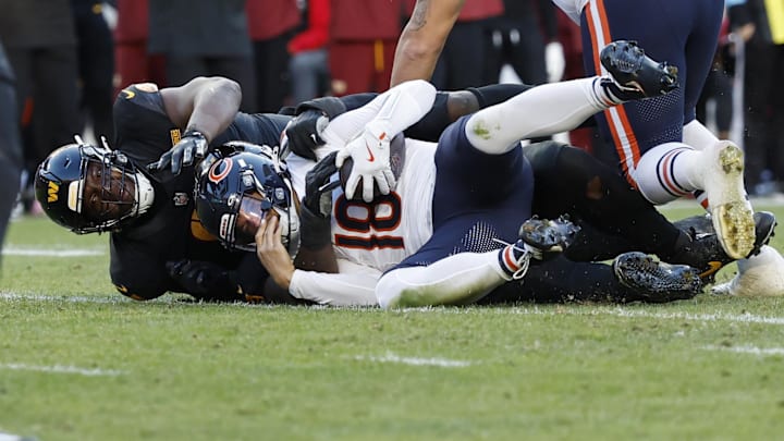 Jalyn Holmes sacks Caleb Williams in Sunday's 18-15 Bears loss to the Commanders. Jalyn Holmes sacks Caleb Williams in Sunday's 18-15 Bears loss to the Commanders.