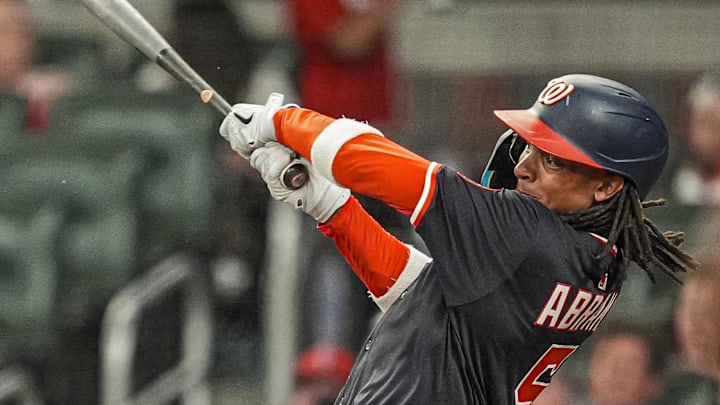 Sep 23, 2025; Cumberland, Georgia, USA; Washington Nationals shortstop CJ Abrams (5) hits a single to drive in a run against the Atlanta Braves during the third inning at Truist Park. Mandatory Credit: Dale Zanine-Imagn Images