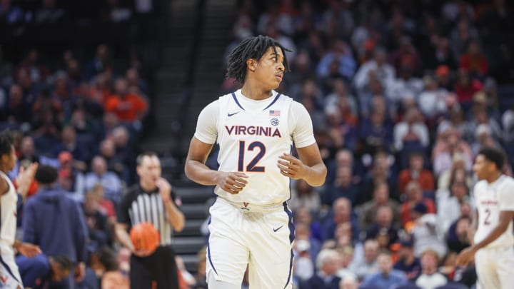 Elijah Gertrude jogs during the Virginia men's basketball game against Texas A&M at John Paul Jones Arena.