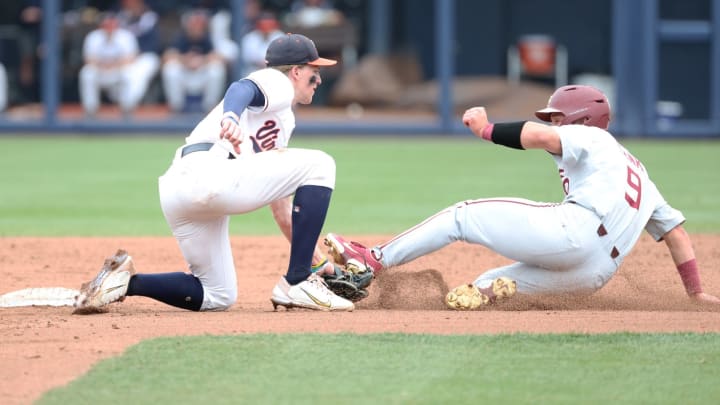 Griff O'Ferrall tags out a runner during the Virginia baseball game against Florida State at Disharoon Park. Griff O'Ferrall tags out a runner during the Virginia baseball game against Florida State at Disharoon Park.