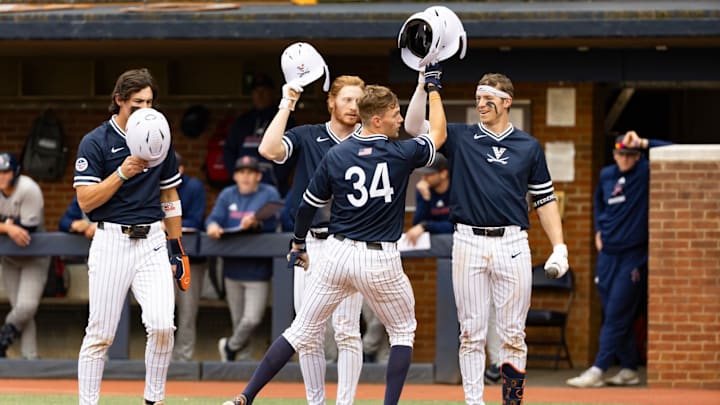 Harrison Didawick celebrates after hitting a home run during the Virginia baseball game against Richmond at Disharoon Park.
