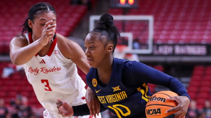 West Virginia's Jordan Harrison dribbles against Texas Tech during a Big 12 Conference women's basketball game, Wednesday, Jan. 8, 2025, in United Supermarkets Arena.