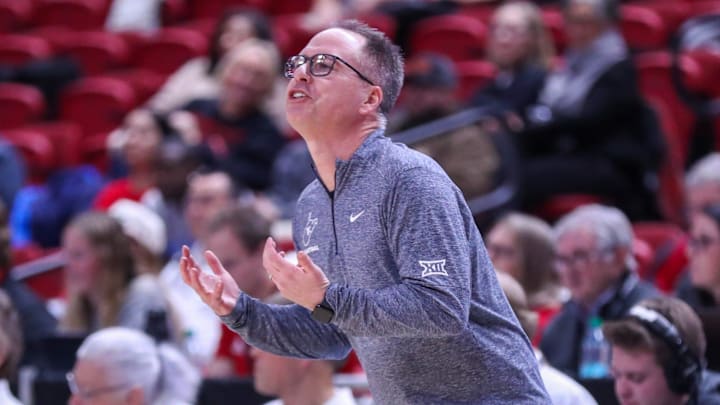 West Virginia head coach Mark Kellogg instructs his team during a Big 12 Conference women's basketball game against Texas Tech, Wednesday, Jan. 8, 2025, in United Supermarkets Arena.