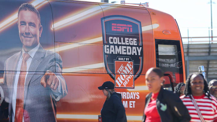 Red Raider fans walk in front of an ESPN College GameDay bus on the Texas Tech University campus on Nov. 7, 2025 in Lubbock, Texas. The program will broadcast live on Saturday morning leading into the Red Raiders v. BYU Cougars football game. Red Raider fans walk in front of an ESPN College GameDay bus on the Texas Tech University campus on Nov. 7, 2025 in Lubbock, Texas. The program will broadcast live on Saturday morning leading into the Red Raiders v. BYU Cougars football game.