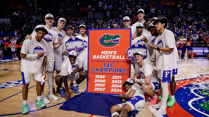 Feb 28, 2026; Gainesville, Florida, USA; Florida Gators players pose for a team photo while celebrating the SEC regular season championship following the game against the Arkansas Razorbacks at Exactech Arena at the Stephen C. O'Connell Center. Mandatory Credit: Travis Register-Imagn Images Feb 28, 2026; Gainesville, Florida, USA; Florida Gators players pose for a team photo while celebrating the SEC regular season championship following the game against the Arkansas Razorbacks at Exactech Arena at the Stephen C. O'Connell Center. Mandatory Credit: Travis Register-Imagn Images