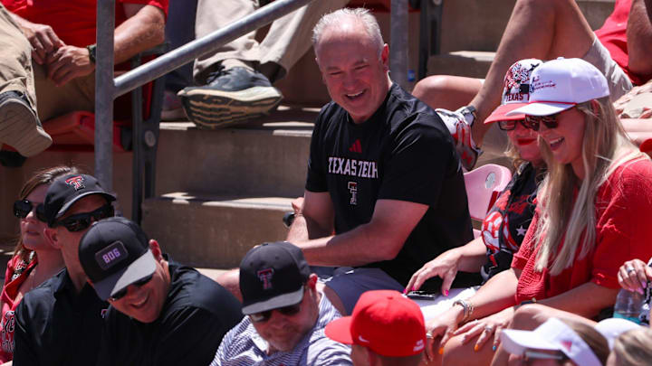 Joey McGuire and members of the Texas Tech football coaching staff attend the Lubbock Regional championship game of the 2025 NCAA softball tournament, Sunday, May 18, 2025, at Rocky Johnson Field.