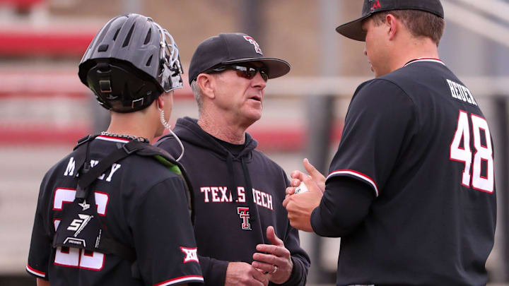 Texas Tech head coach Tim Tadlock (center) talks to Mac Heuer and Dylan Maxcey during a Big 12 baseball game, Friday, April 4, 2025, at Dan Law Field.