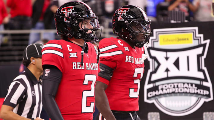 Texas Tech seniors Behren Morton (2) and Bryce Ramirez walk to the field before the Big 12 Conference championship football game, Saturday, Nov. 6, 2025, at AT&T Stadium in Arlington. Texas Tech seniors Behren Morton (2) and Bryce Ramirez walk to the field before the Big 12 Conference championship football game, Saturday, Nov. 6, 2025, at AT&T Stadium in Arlington.