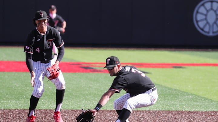 Texas Tech's Tracer Lopez attempts to collect a throw from the catcher on UAlbany's stolen base attempt during a non-conference baseball game, Friday, Feb. 20, 2026, at Rip Griffin Park.