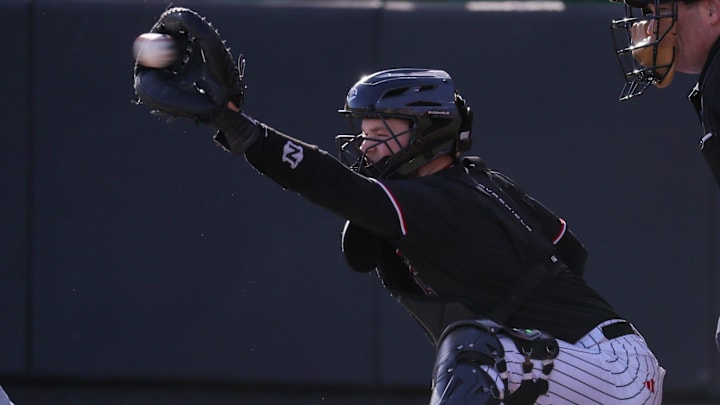 Texas Tech's Davis Rivers catches a pitch against UAlbany during a non-conference baseball game, Friday, Feb. 20, 2026, at Rip Griffin Park.