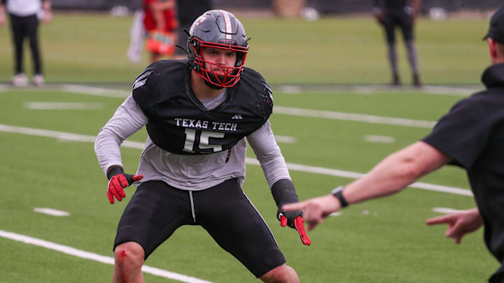 Texas Tech's Austin Romaine goes through a drill during spring football practice, Tuesday, April 14, 2026, at the Womble Football Center.