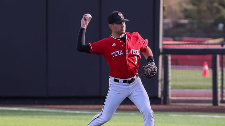 Texas Tech's Tracer Lopez prepares to throw for an out against Abilene Christian during a non-conference Division I baseball game, Tuesday, March 31, 2026, at Rip Griffin Park.