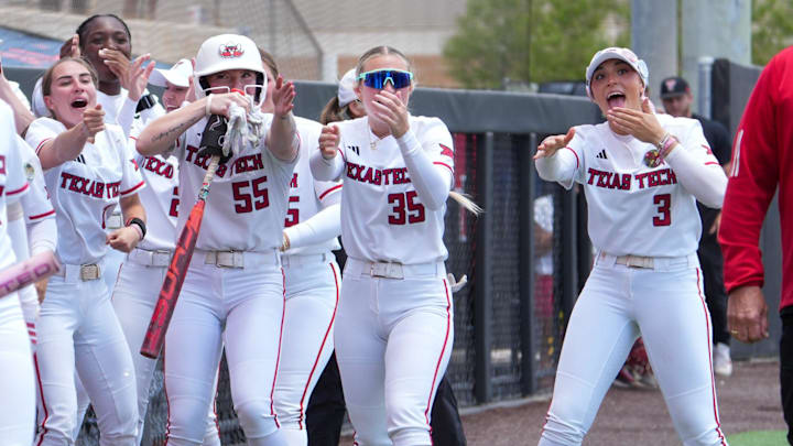 Texas Tech players react to a home run by Jasmyn Burns during a Big 12 Conference softball game, Saturday, May 2, 2026, at Tracy Sellers Field.