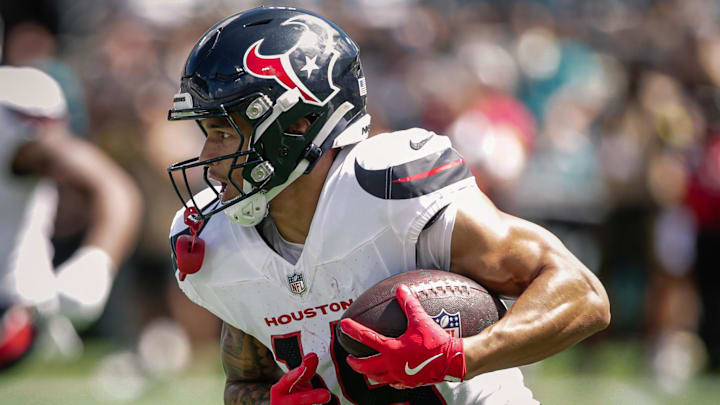 Sep 21, 2025; Jacksonville, Florida, USA; Houston Texans wide receiver Jaylin Noel (14) runs with the ball against the Jacksonville Jaguars at EverBank Stadium. Mandatory Credit: Travis Register-Imagn Images Sep 21, 2025; Jacksonville, Florida, USA; Houston Texans wide receiver Jaylin Noel (14) runs with the ball against the Jacksonville Jaguars at EverBank Stadium. Mandatory Credit: Travis Register-Imagn Images