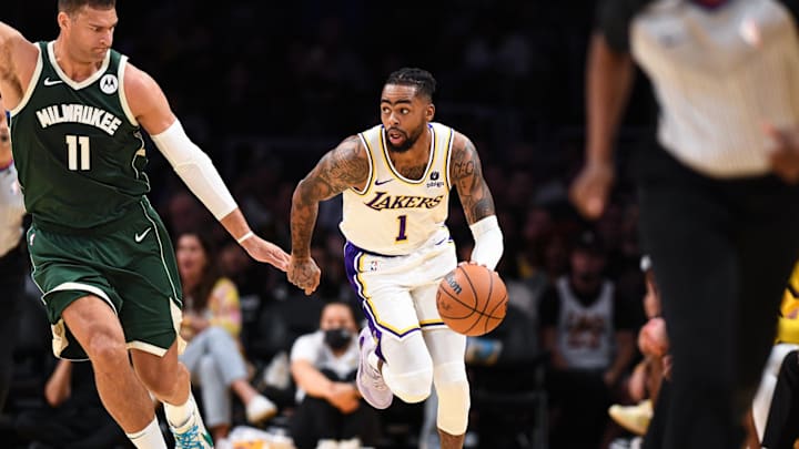 Oct 15, 2023; Los Angeles, California, USA; Los Angeles Lakers guard D'Angelo Russell (1) moves the ball against Milwaukee Bucks center Brook Lopez (11) in the first quarter at Crypto.com Arena. Mandatory Credit: Jonathan Hui-Imagn Images Oct 15, 2023; Los Angeles, California, USA; Los Angeles Lakers guard D'Angelo Russell (1) moves the ball against Milwaukee Bucks center Brook Lopez (11) in the first quarter at Crypto.com Arena. Mandatory Credit: Jonathan Hui-Imagn Images