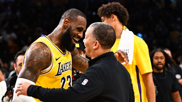 Nov 1, 2023; Los Angeles, California, USA; Los Angeles Lakers forward LeBron James (23) embraces head coach Tyronn Lue of the LA Clippers after the Lakers won during overtime at Crypto.com Arena. Mandatory Credit: Jonathan Hui-Imagn Images