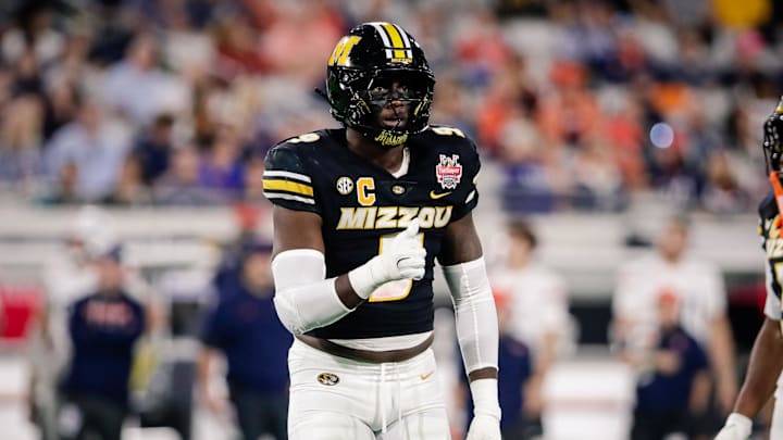 Dec 27, 2025; Jacksonville, FL, USA; Missouri Tigers defensive end Zion Young (9) looks on before a play against the Virginia Cavaliers in the first half at EverBank Stadium. Mandatory Credit: Travis Register-Imagn Images