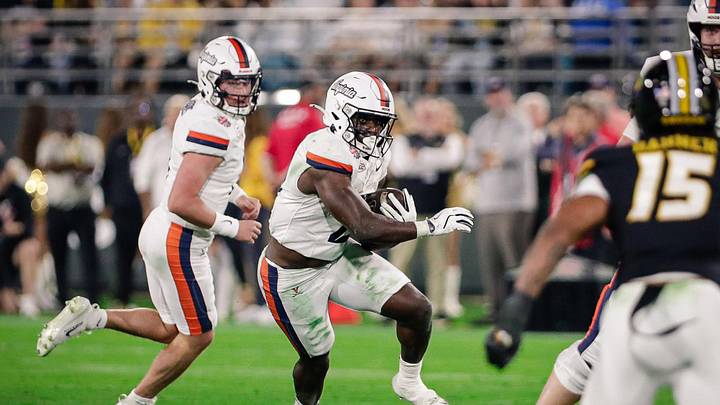 Dec 27, 2025; Jacksonville, FL, USA; Virginia Cavaliers running back Harrison Waylee (21) runs the ball against the Missouri Tigers during the second quarter at EverBank Stadium. Mandatory Credit: Travis Register-Imagn Images Dec 27, 2025; Jacksonville, FL, USA; Virginia Cavaliers running back Harrison Waylee (21) runs the ball against the Missouri Tigers during the second quarter at EverBank Stadium. Mandatory Credit: Travis Register-Imagn Images