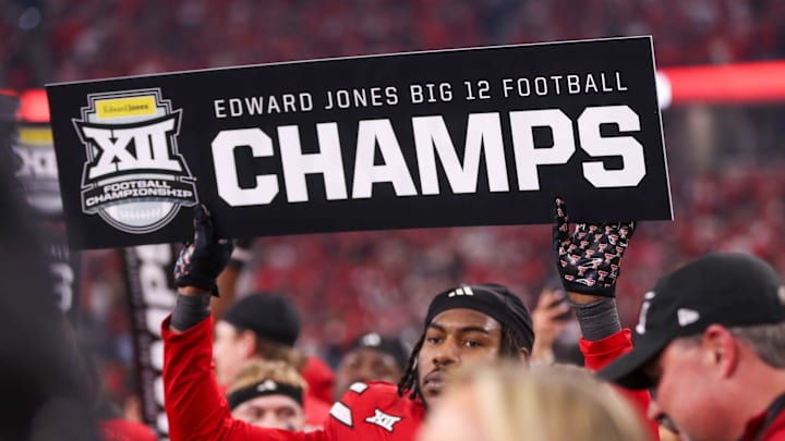 Texas Tech's Charles Esters III holds a sign after the Big 12 Conference championship football game at AT&T Stadium in Arlington. Texas Tech's Charles Esters III holds a sign after the Big 12 Conference championship football game at AT&T Stadium in Arlington.