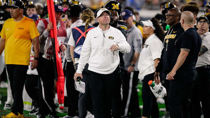 Missouri Tigers head coach Eli Drinkwitz looks up at the scoreboard.