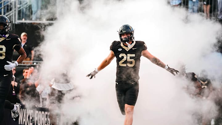 Nov 15, 2025; Winston-Salem, North Carolina, USA; Wake Forest Demon Deacons tight end Harry Lodge (25) runs onto the field before the game against the North Carolina Tar Heels at Allegacy Federal Credit Union Stadium. Mandatory Credit: Wake Forest Athletics via Imagn Images