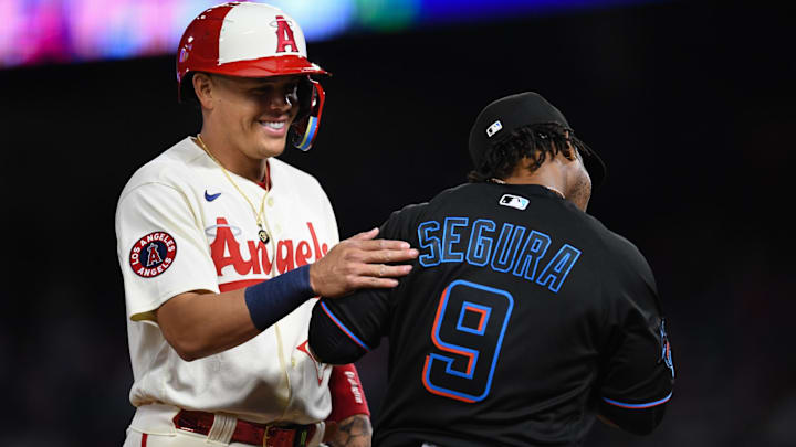 May 26, 2023; Anaheim, California, USA; Los Angeles Angels third baseman Gio Urshela (10) reacts after Miami Marlins third baseman Jean Segura (9) forces him out at third base during the sixth inning at Angel Stadium. Mandatory Credit: Jonathan Hui-Imagn Images May 26, 2023; Anaheim, California, USA; Los Angeles Angels third baseman Gio Urshela (10) reacts after Miami Marlins third baseman Jean Segura (9) forces him out at third base during the sixth inning at Angel Stadium. Mandatory Credit: Jonathan Hui-Imagn Images
