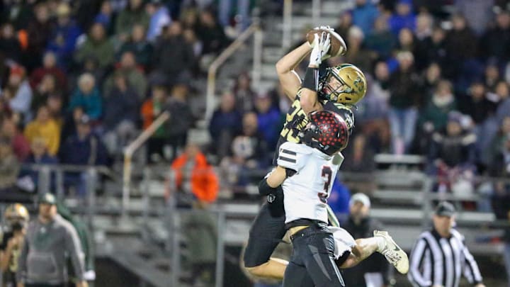 Jackson Heights' Austin Zeller makes a catch against Rossville during Class 1A Sectionals at Jackson Heights High School on Friday, Nov. 15.