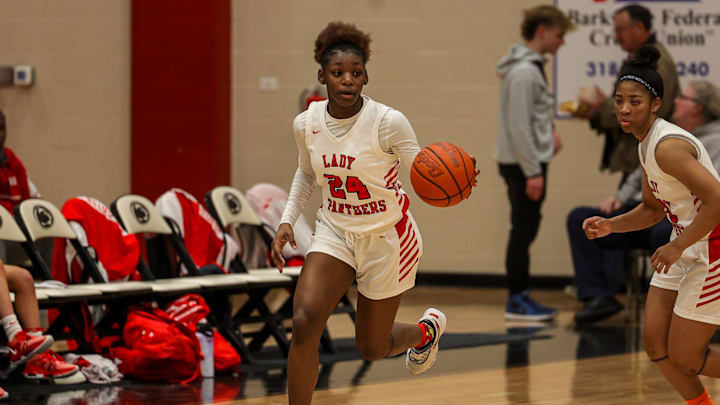 Parkway forward Dakota Howard (24) dribbling down the court during a district 1-5A match-up versus Haughton on Monday, January 22, 2024, in Bossier City, La.